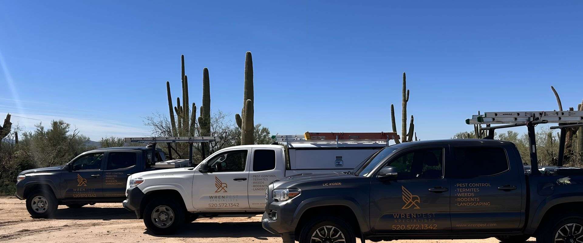 Wren Pest Specialists fleet of branded service trucks in Tucson Arizona