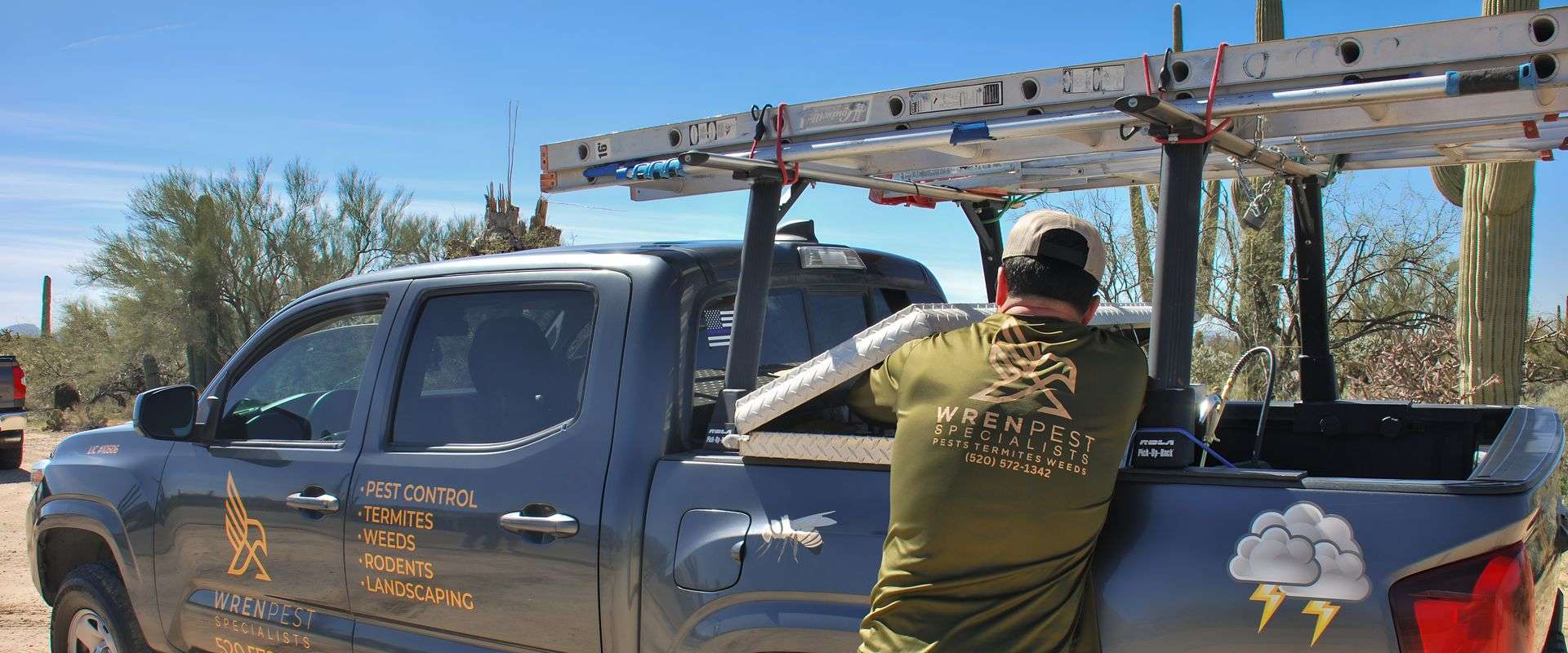 Wren Pest technician treating a Tucson home for cockroach infestation