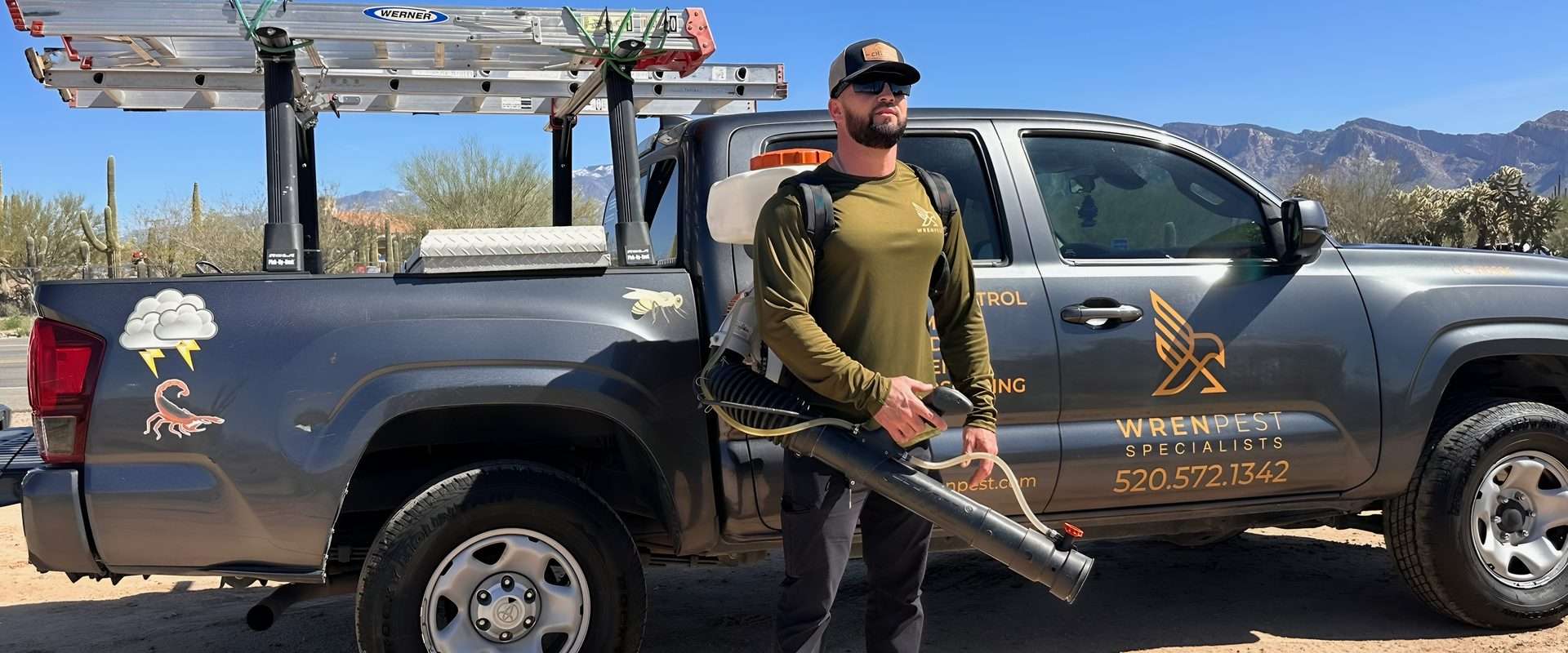 Wren Pest technician equipped for scorpion control treatment in Tucson