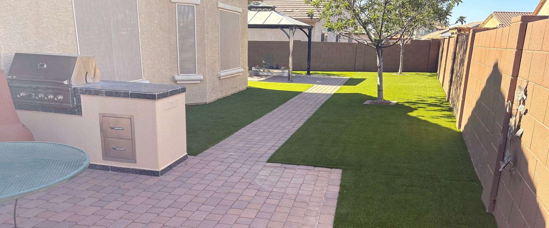 Professional weed control treatment on a Tucson residential property